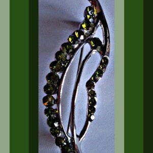 Silver Tone Leaf Theme Brooch With Green Crystals